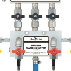 A water meter with three valves and a label.